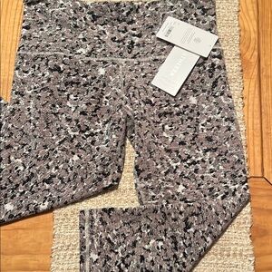 Athleta Black and Gray Leggings with Sleek Design 7/8 length